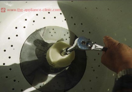 Tighten bolt on agitator shaft