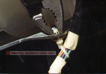 Snap motor harness clip back in