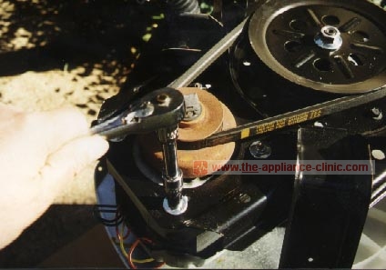 Loosen motor mount bolts